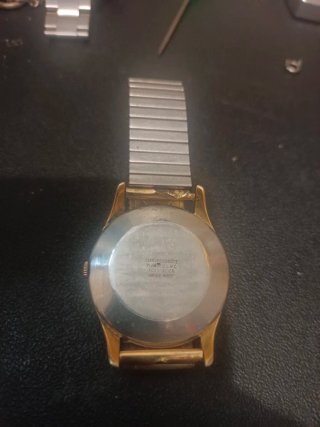 Reloj Titan Automático Dorado