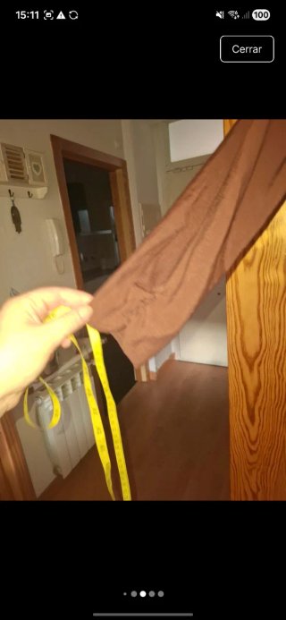 Vestido marrón manga larga.Da mucha talla.