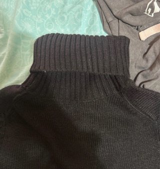 Jersey de lana cuello alto negro