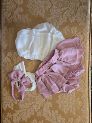 Conjunto body + 2 calções-saia + fitas