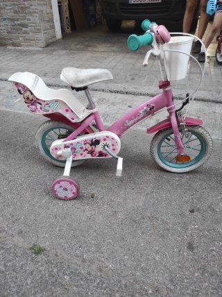 Bicicleta infantil de Minnie rosa con ruedines