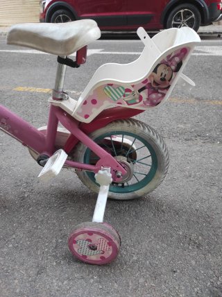 Bicicleta infantil de Minnie rosa con ruedines