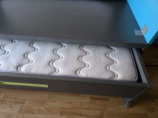 Cama nido con cajones.