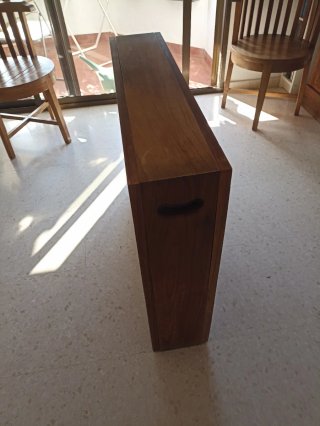 Mesa de comedor plegable de madera de teka.