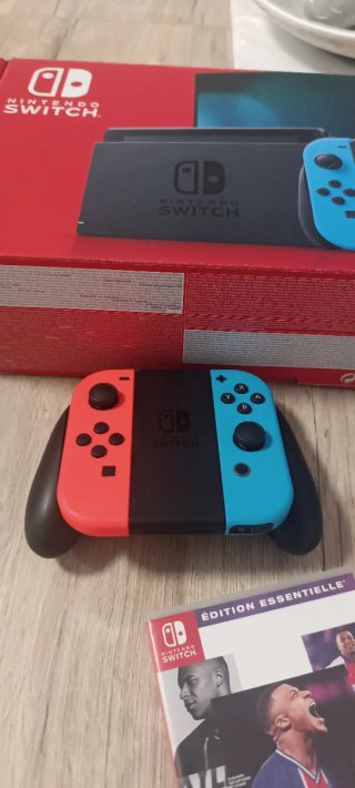 Nintendo Switch + Juegos + mandos + accesorios
