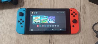 Nintendo Switch + Juegos + mandos + accesorios