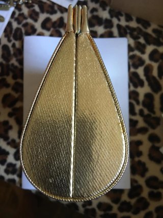 Guerlain . Bolso de fiesta dorado