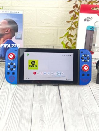 Consola Nintendo switch+ juego+ cargador+accesorio