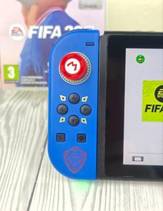 Consola Nintendo switch+ juego+ cargador+accesorio