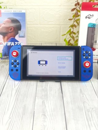 Consola Nintendo switch+ juego+ cargador+accesorio