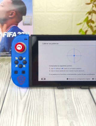 Consola Nintendo switch+ juego+ cargador+accesorio