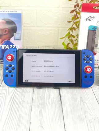 Consola Nintendo switch+ juego+ cargador+accesorio