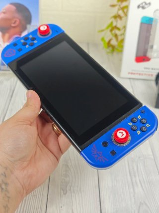 Consola Nintendo switch+ juego+ cargador+accesorio