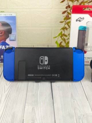 Consola Nintendo switch+ juego+ cargador+accesorio