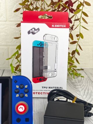Consola Nintendo switch+ juego+ cargador+accesorio