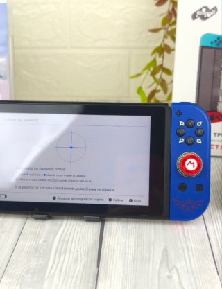 Consola Nintendo switch+ juego+ cargador+accesorio