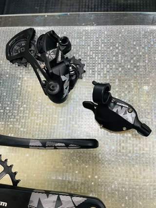 SRAM NX Eagle Bielas, pulsador y Cambio