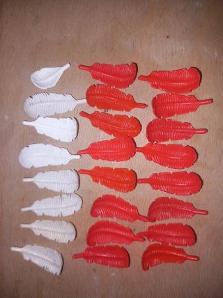 Playmobil plumas rojas y blancas