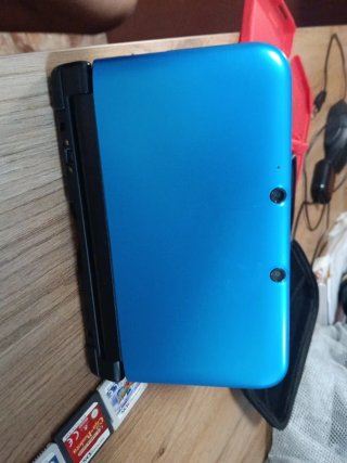Nintendo 3DS XL Roja + 5 Juegos