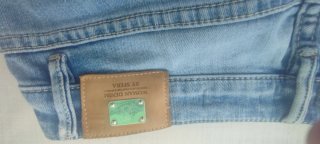 Vaqueros pitillo con detalles