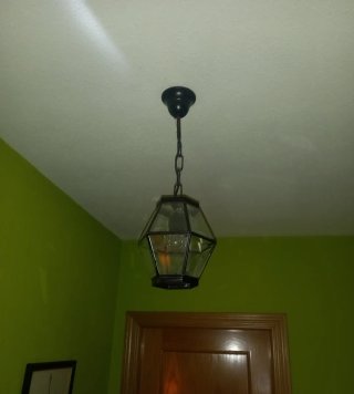 Farol colgante de metal y cristal