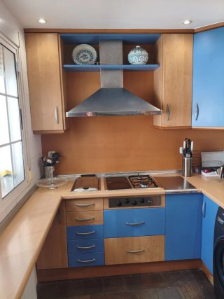 Muebles de cocina madera y azul
