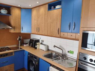 Muebles de cocina madera y azul