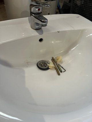 Lavabo de cerámica con pedestal