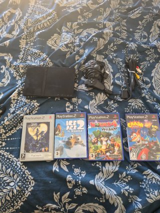 Consola PS2 con mando y 2 juegos
