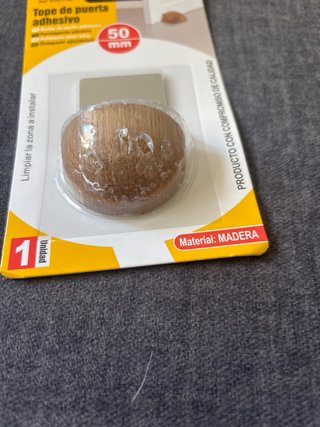 Tope de puerta adhesivo 50mm madera
