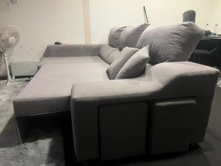 Sofá cama gris con arcón