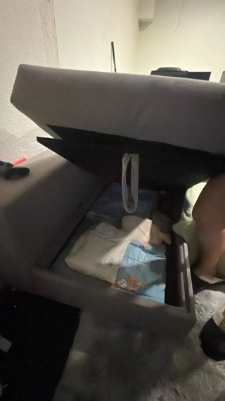 Sofá cama gris con arcón