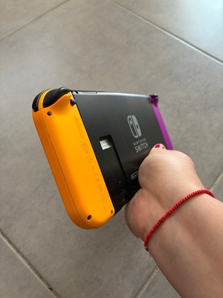 Nintendo Switch Morado y Naranja