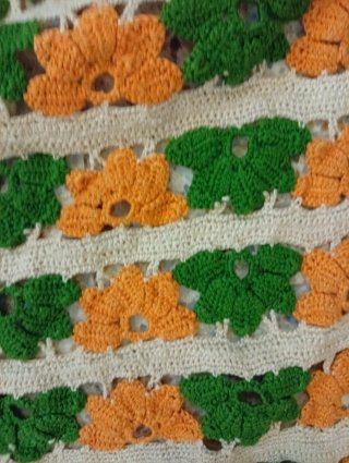 Manta tejida a mano naranja y verde