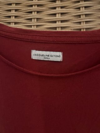 Top rosso smanicato