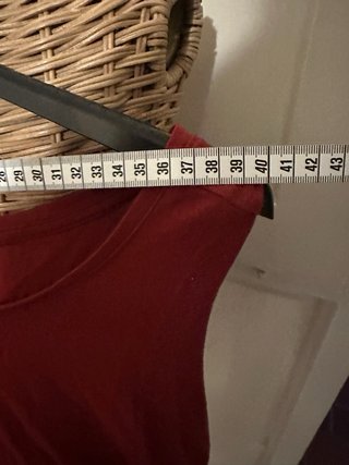 Top rosso smanicato