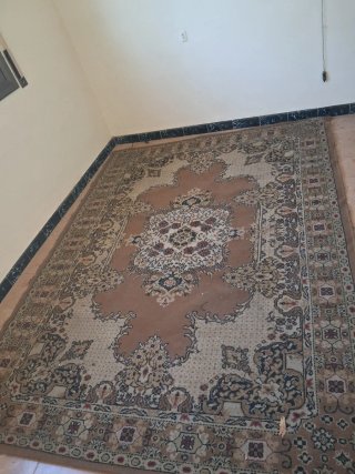 Alfombra persa beige y multicolor