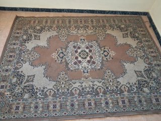 Alfombra persa beige y multicolor