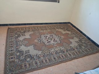 Alfombra persa beige y multicolor