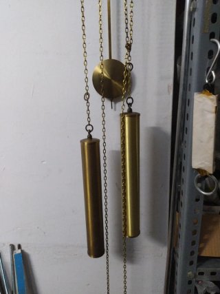 Reloj de pared antiguo dorado