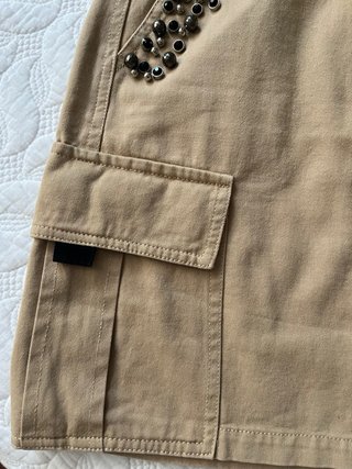 Minifalda beige con tachuelas