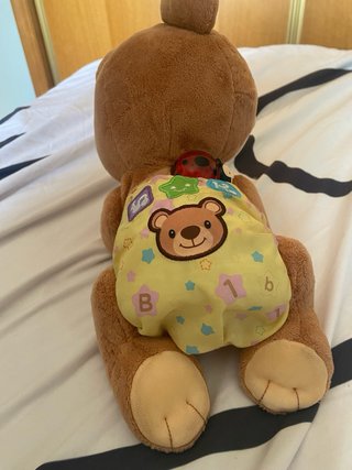 Oso de peluche musical para gatear