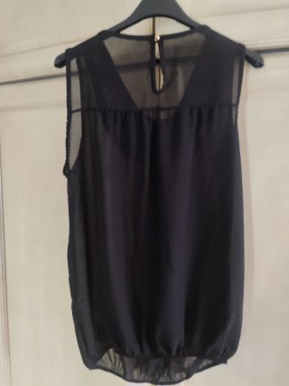 Top elegante con perline