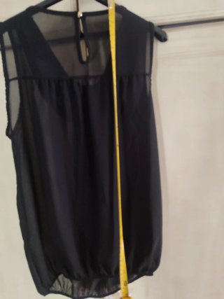 Top elegante con perline