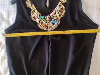 Top elegante con perline