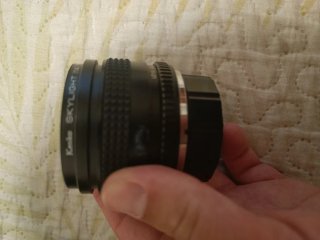 Objetivo Sun 28mm f/2.5 Wide-Auto con funda y tapa