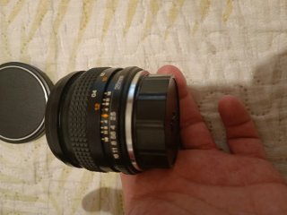 Objetivo Sun 28mm f/2.5 Wide-Auto con funda y tapa