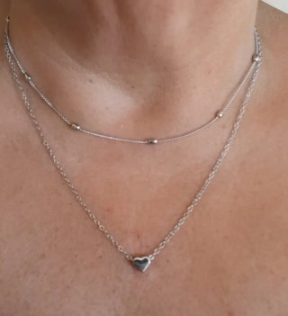 Doble gargantilla con corazón plateada.Nueva