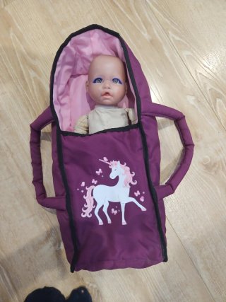 Carrito de muñecas rosa y morado
