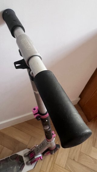 Patinete Decathlon rosa y plateado